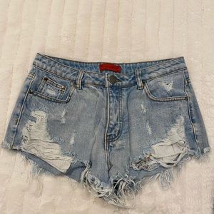 Distressed denim shorts
